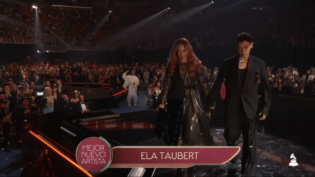 Ela Taubert walks to the Latin Grammys' stage to accept award.